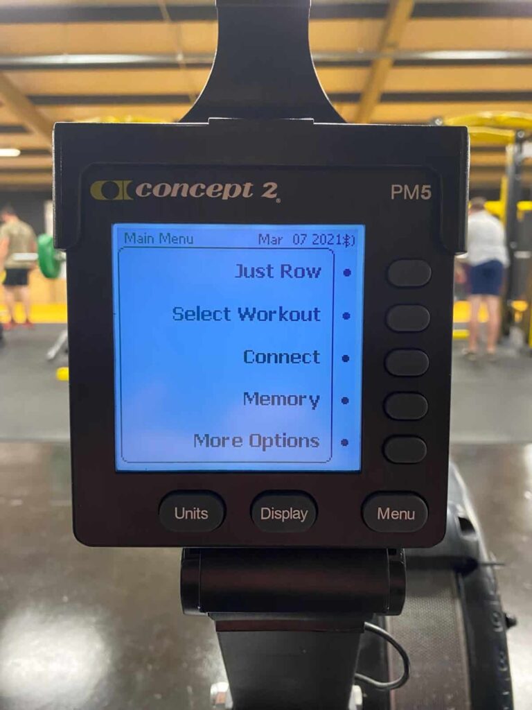 a monitor showing 2000m rowing times