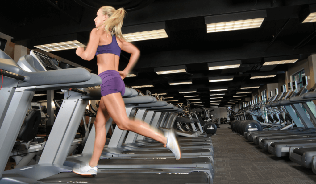 A woman running on a treadmill