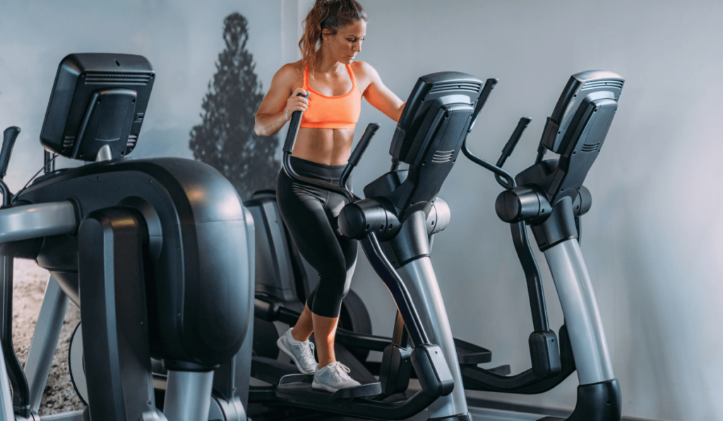 A woman running on elliptical