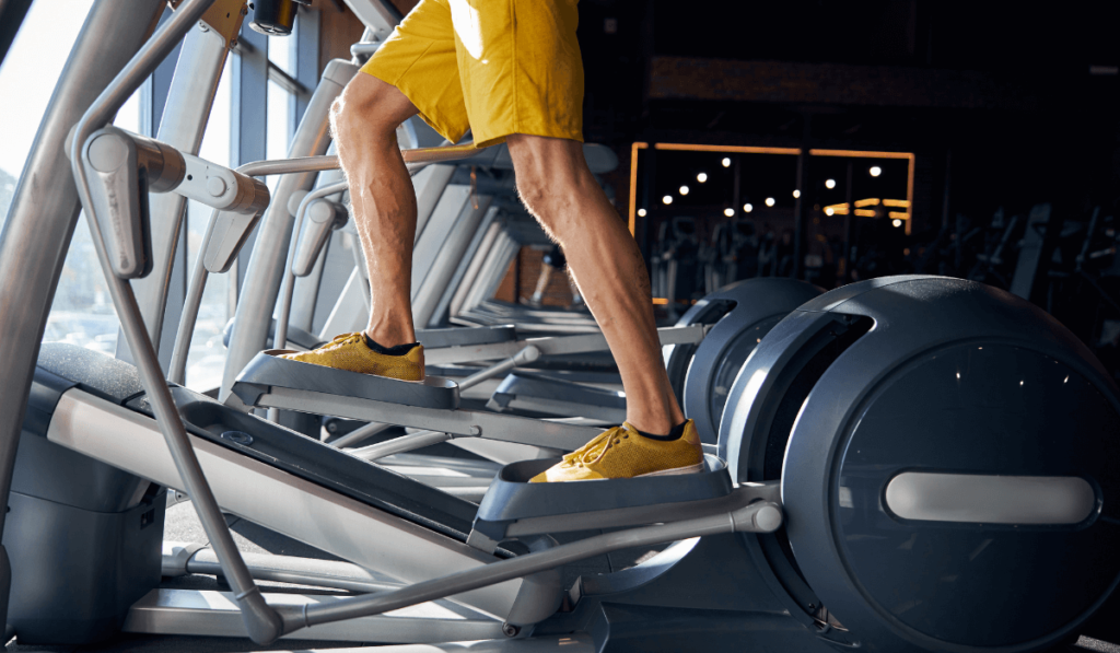 A man running on elliptical