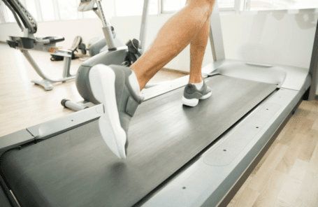 Someone running on the best Proform treadmill