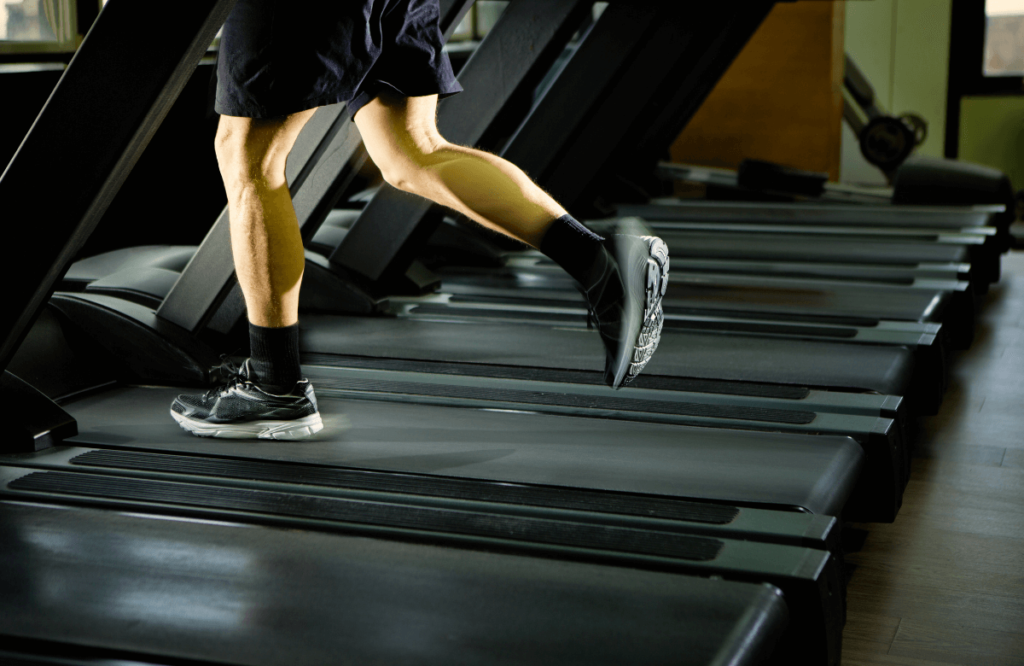 A man running on the best Proform treadmill