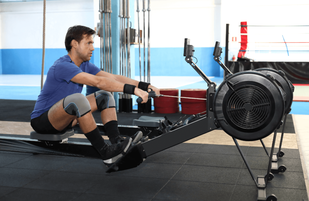 A man rowing at the gym after reading a Concept 2 Model E review 
