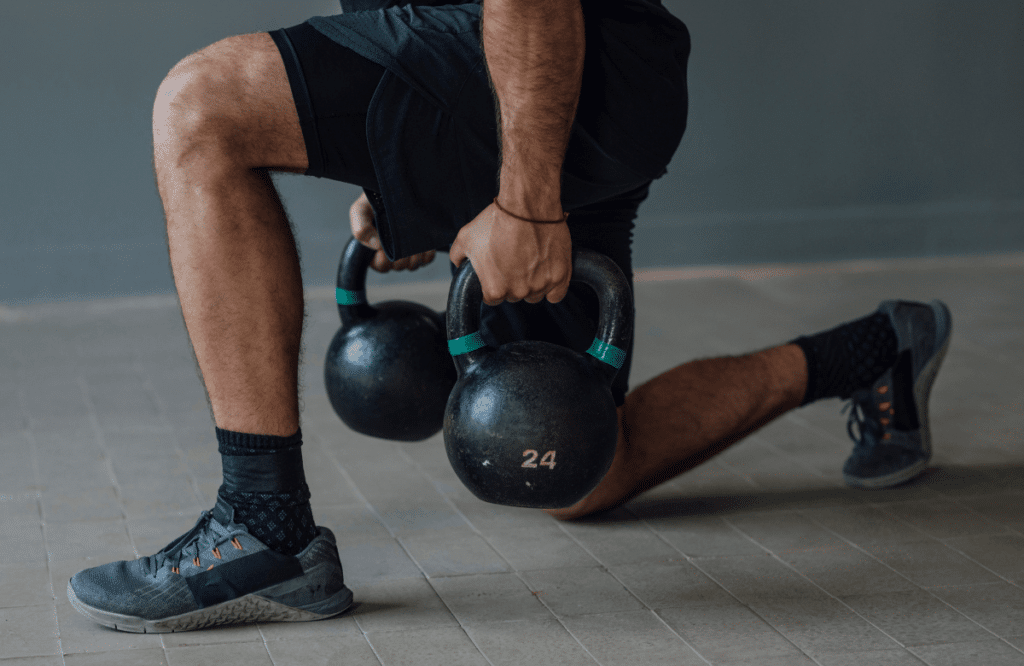 A man lifting kettlebells during his kettlebell tabata sessions