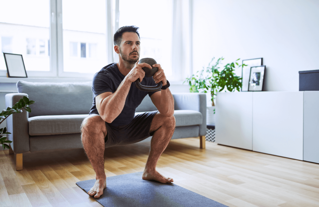 A man feeling knee pain when squatting