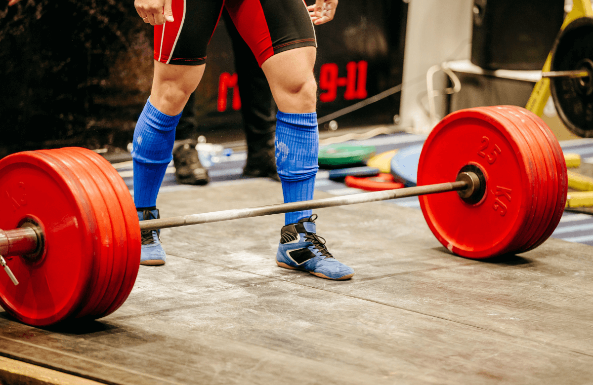 A man during a deadlift competition using the best deadlift slippers