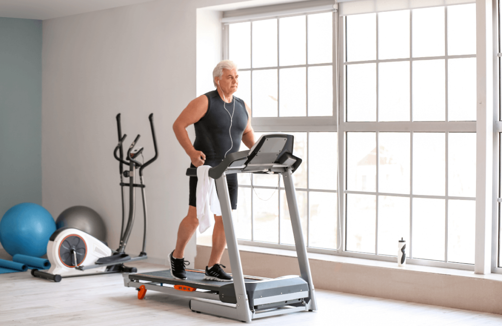 A man running on a treadmill not hearing any treadmill noise