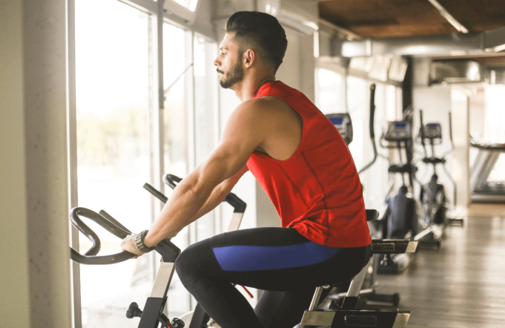 A man wondering which between elliptical vs bike is the best