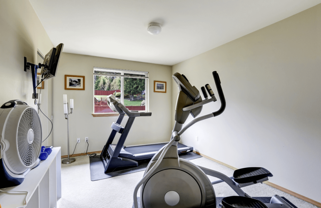 A home gym after the owner read a Schwinn 411 elliptical review