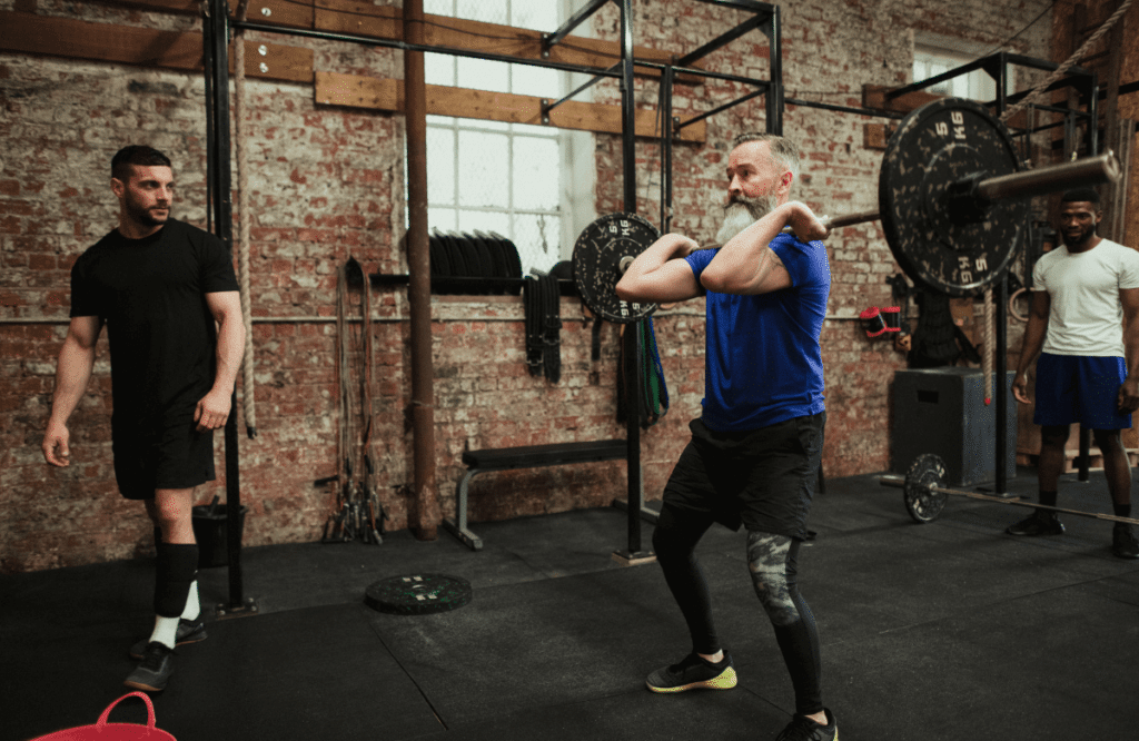 A man at the gym doing deadlift for hypertrophy