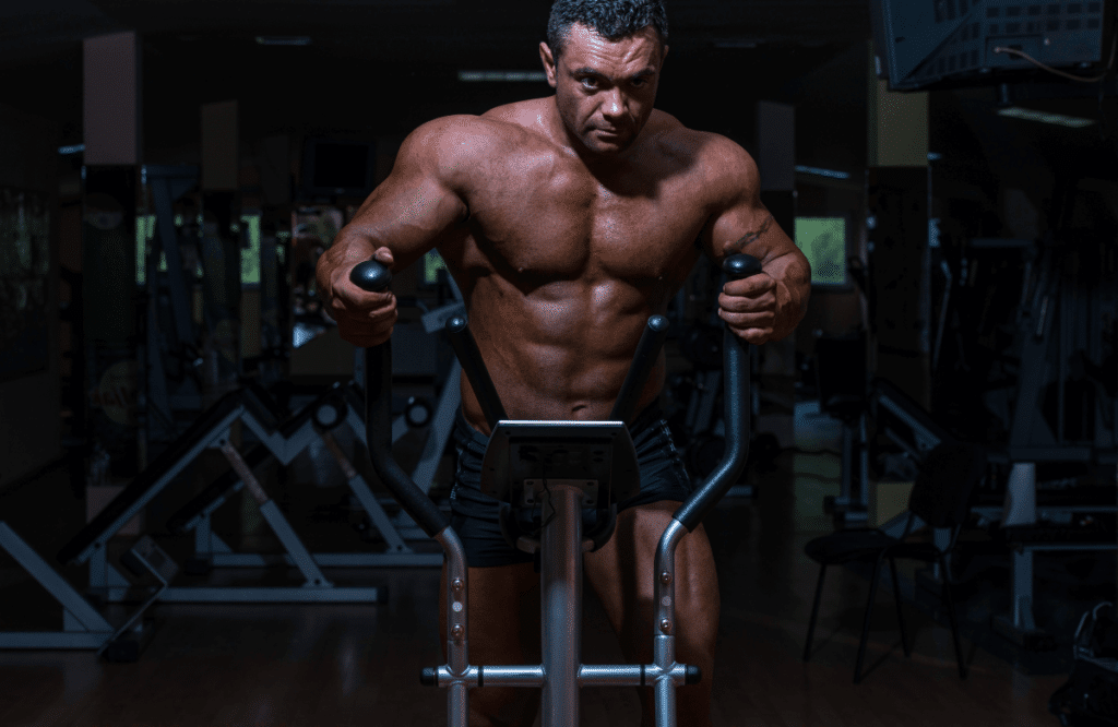 A muscular man knowing what muscles the elliptical work