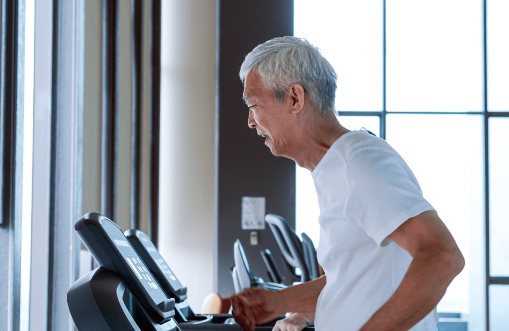 A senior trying one of the best treadmills for seniors