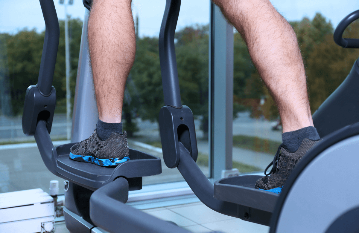 Muscular legs on an elliptical to illustrate what muscles do the elliptical work