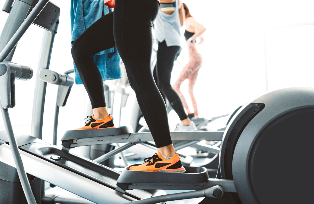 A woman using the best shoes for elliptical training