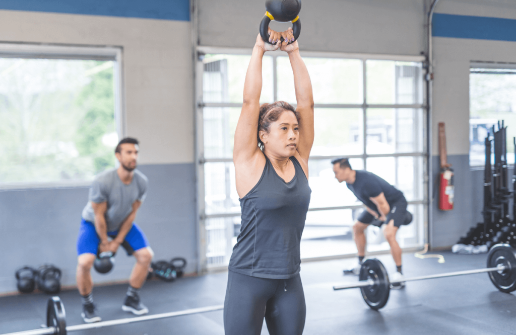 A woman at the gym wondering how to get rid of pre-workout side effects