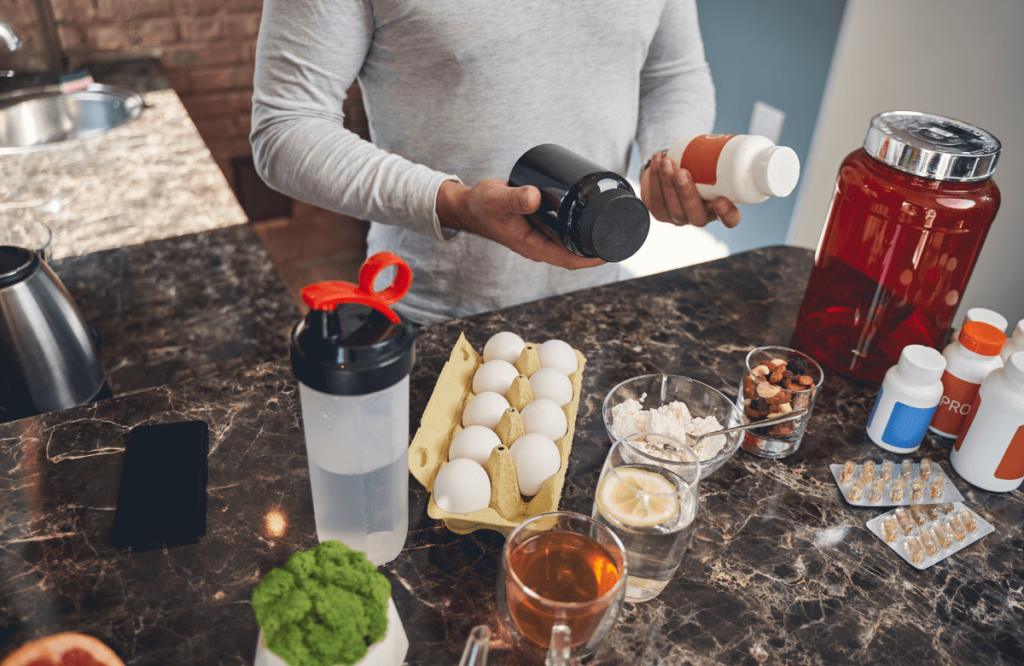 A man preparing a proper pre-workout shake