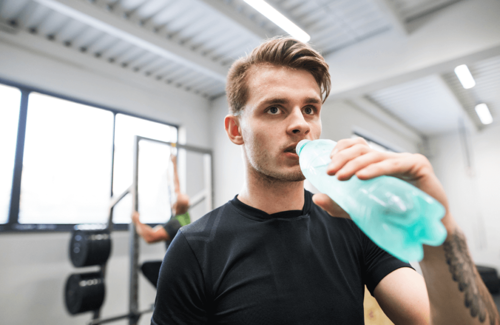 A man resting after finding how long is required to build muscle