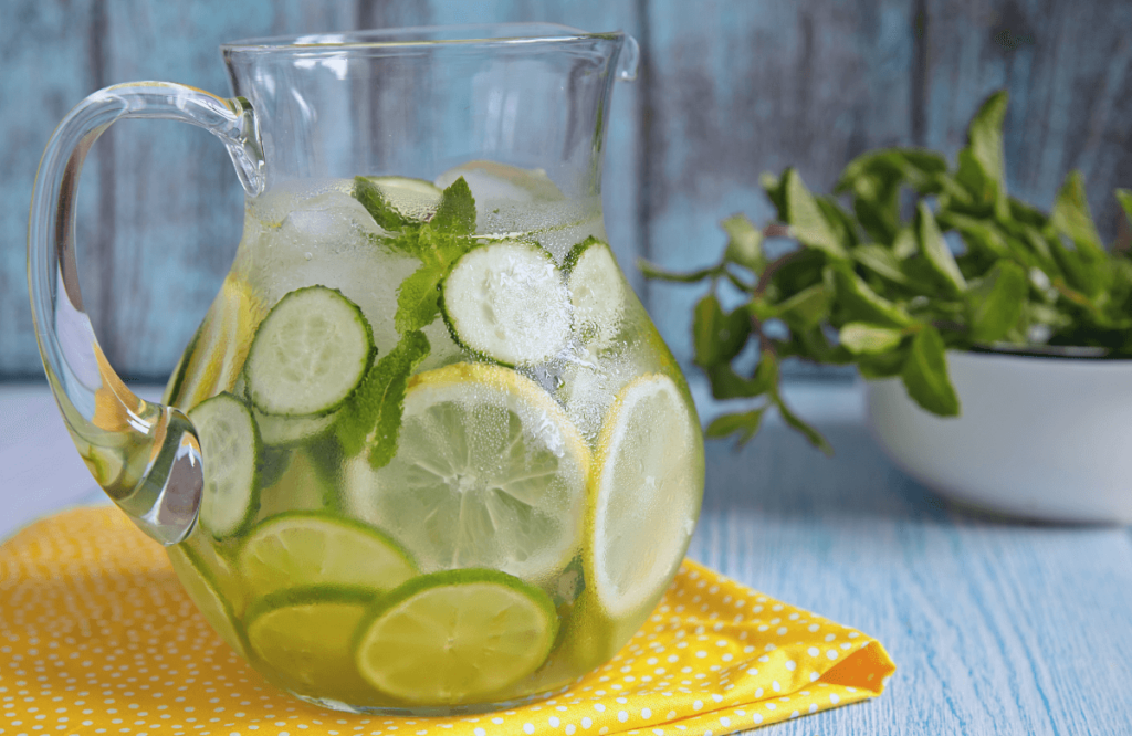 A jar full of water, lemon and mint that can be used during water fasting for weight loss