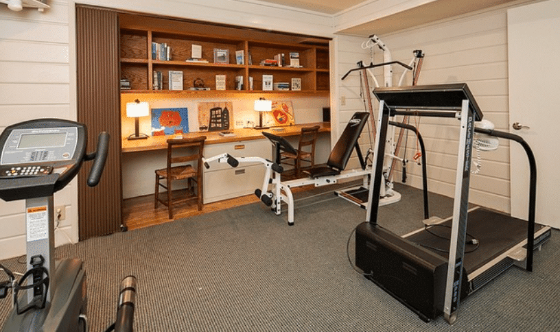 A home gym in a workspace as one of the home gym ideas on a budget we recommend