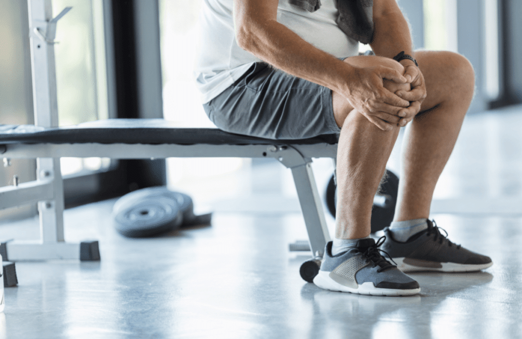 A man experiencing pain in his joints