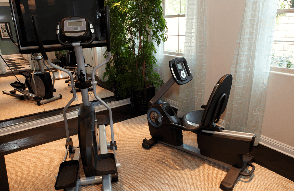 A home gym with an ellipticial after the owner read a nordictrack commercial 14.9 elliptical review
