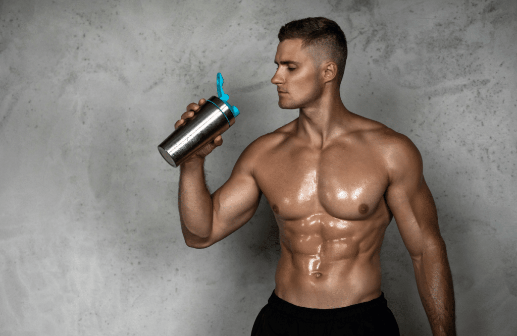 A man drinking his preparation based on the best cheap pre-workout