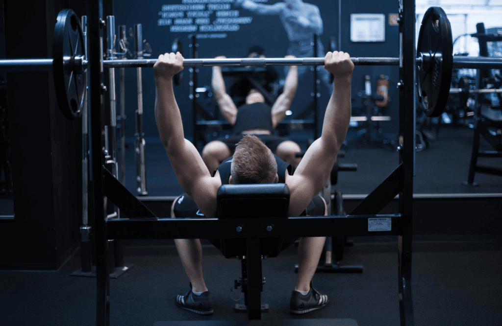 A man deadlifting at an Orangetheory gym