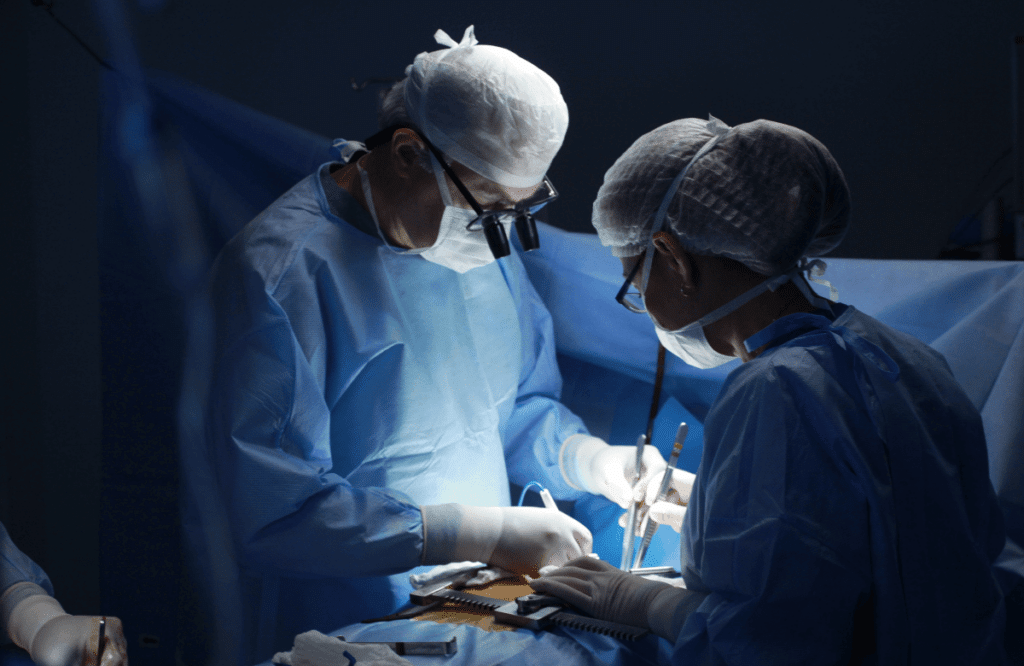 Surgeons during a hip dip surgery