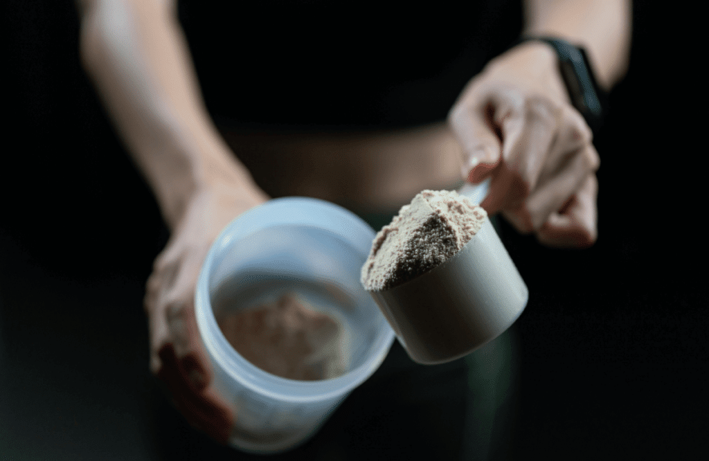 A man preparing his non-stim pre-workout shake