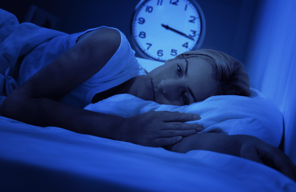 A woman experiencing insomnia due to eca stack