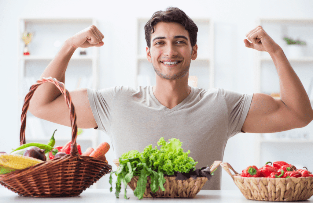 A man eating properly because he knows how to get wider biceps