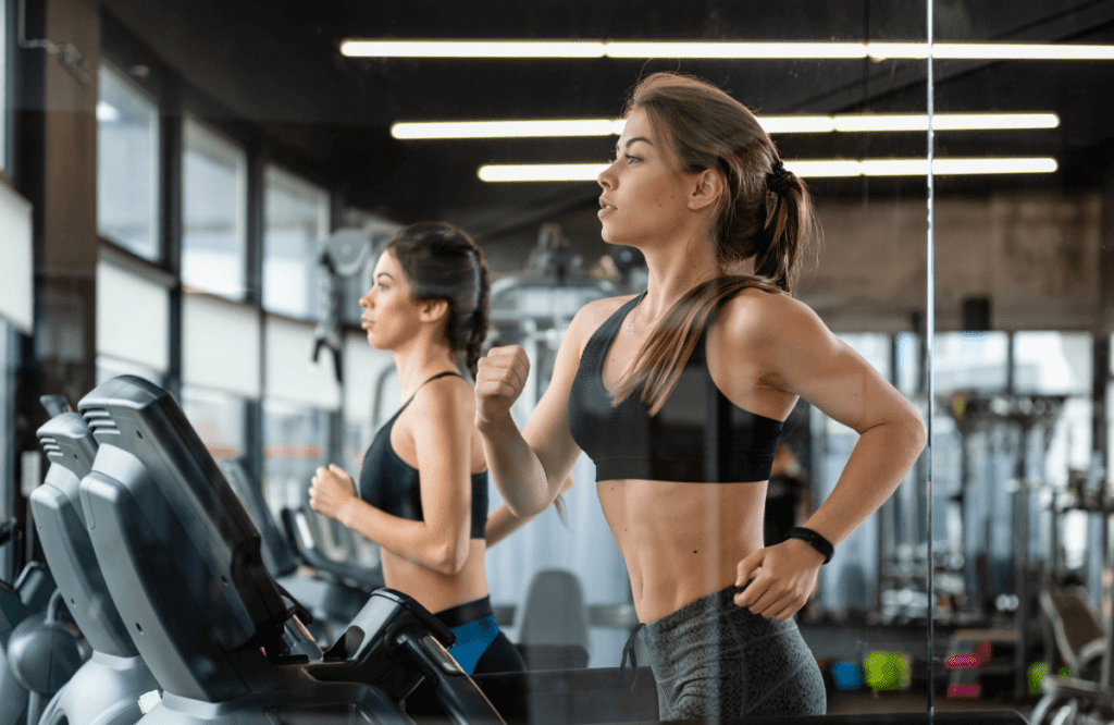 Two women doing the Peloton VS NordicTrack Treadmill comparative