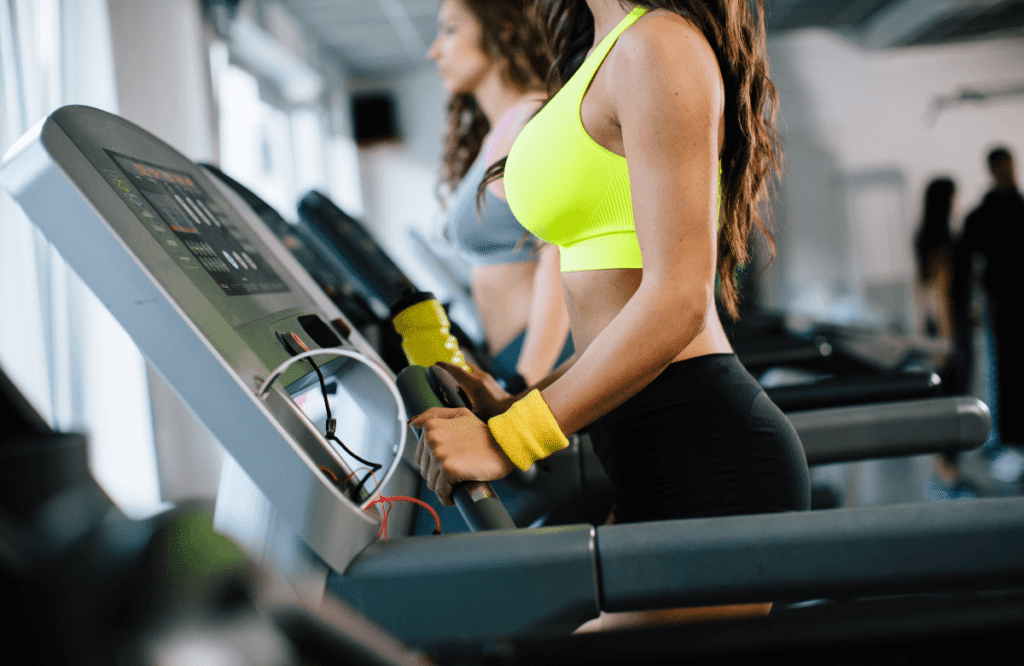 A woman running on a NordicTrack treadmill