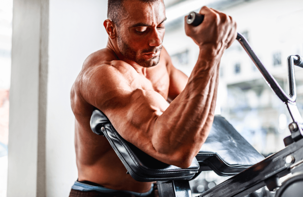 A man with the correct arm position during long head bicep exercises