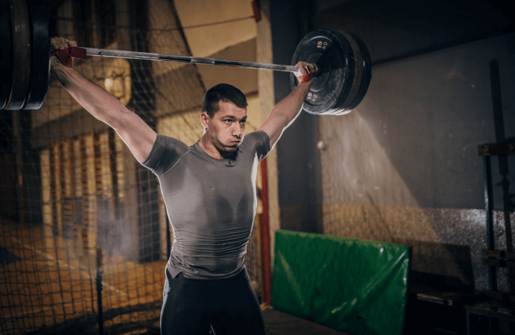 a man doing a deadlift for back training