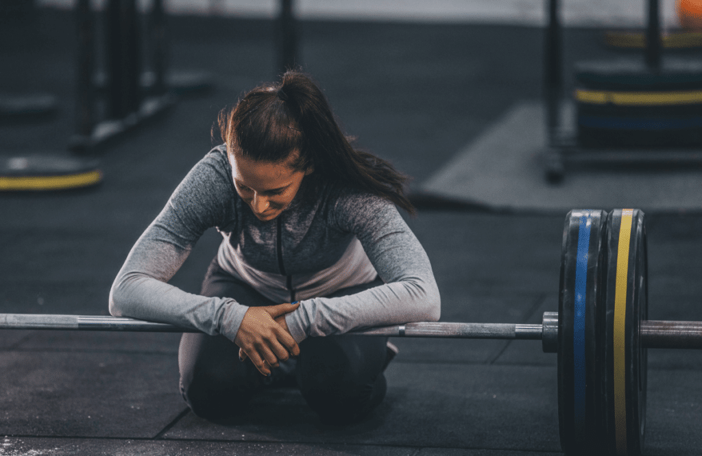 A woman who overtrained during her deadlift for back session