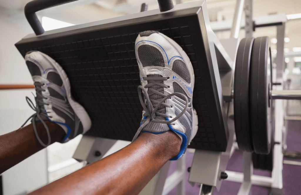 Someone using a leg press