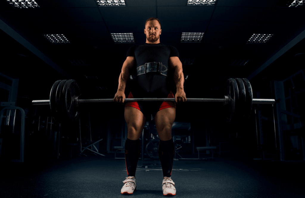 A man using a classic deadlift bar