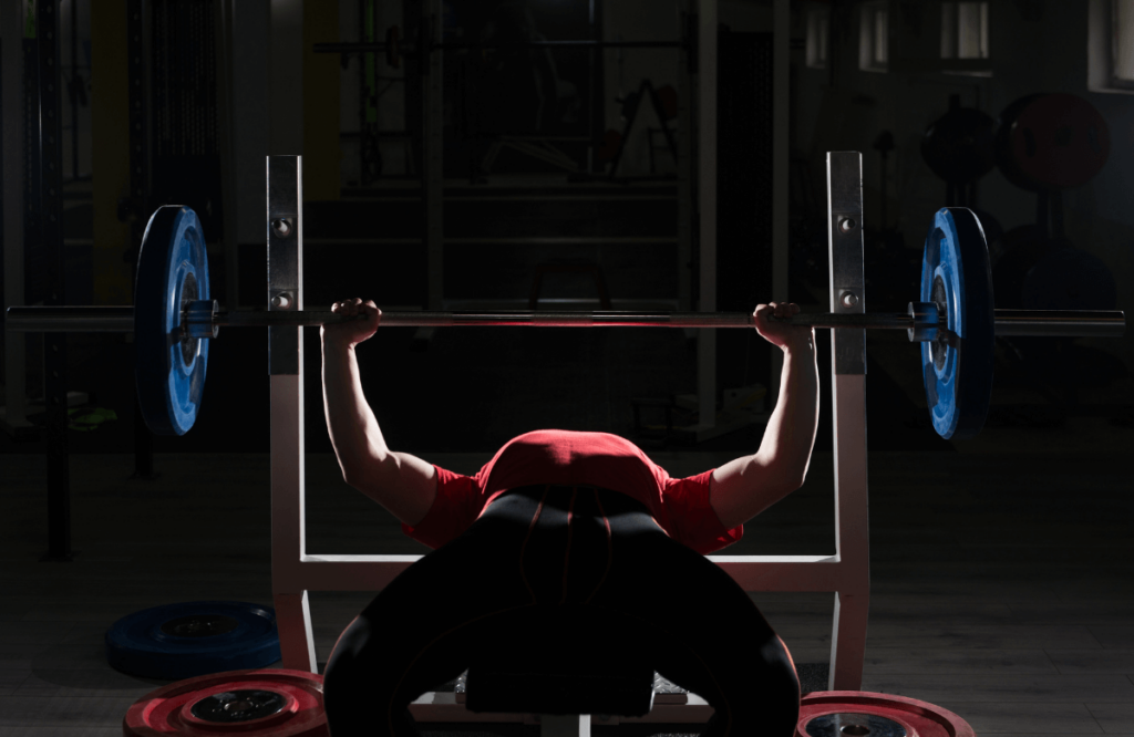 A man doing bench press