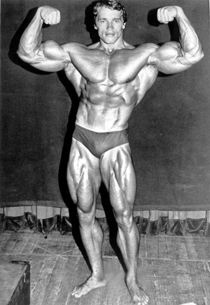 Photo of Arnold Schwarzenegger before defending the title for his fifth Mr. Olympia contest in 1974.