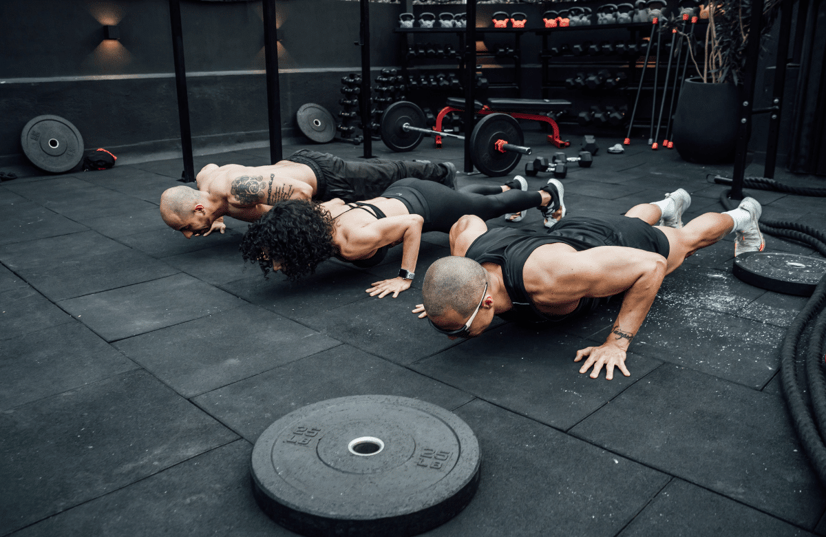 people doing push-ups as body weight exercises