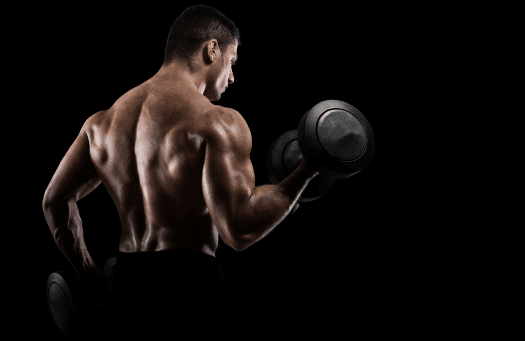 A man using a dumbbell during a biceps workout