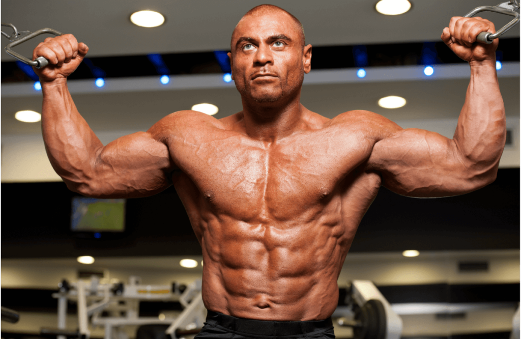 A man doing full body workouts using a cable machine