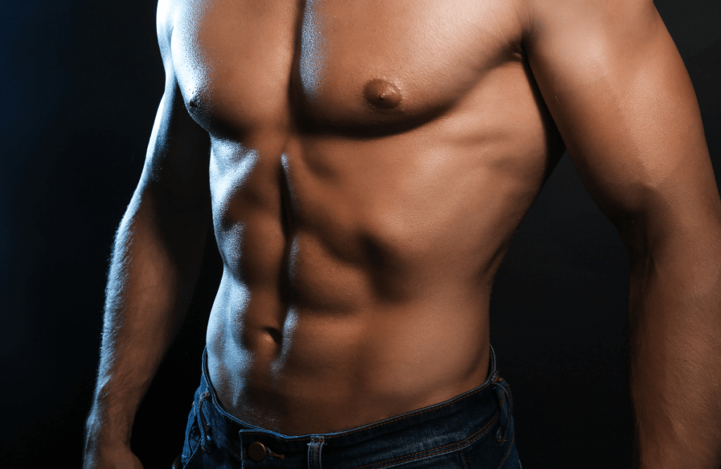 A man with a toned torso after doing oblique exercises