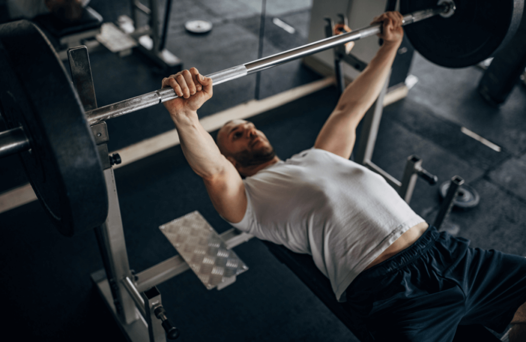 A man performing bench presses