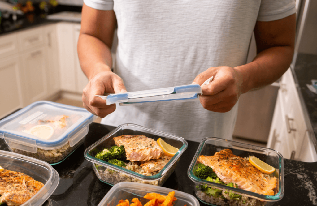 A man meal preping to gain muscle