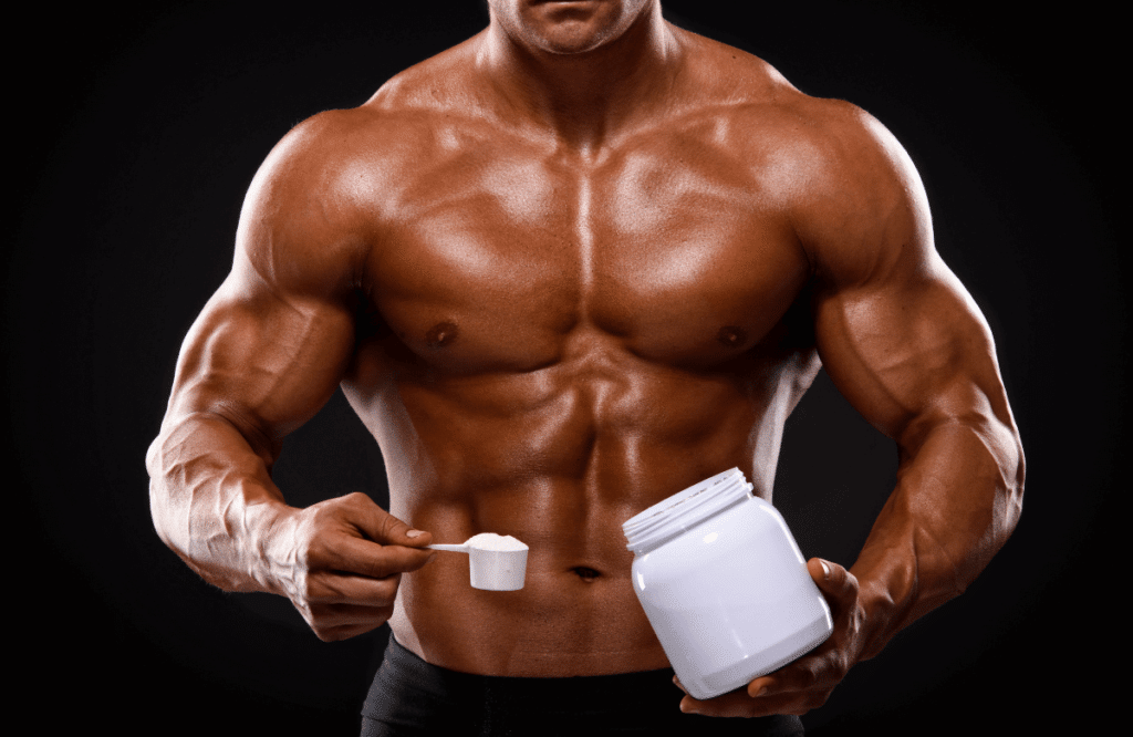 A strong man holding the best creatine in its hands