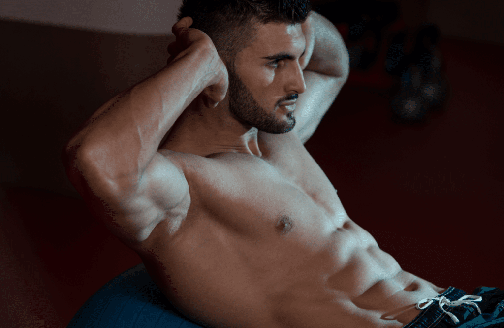 Fit man does regular crunches