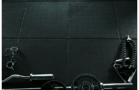 Gym flooring with barbells