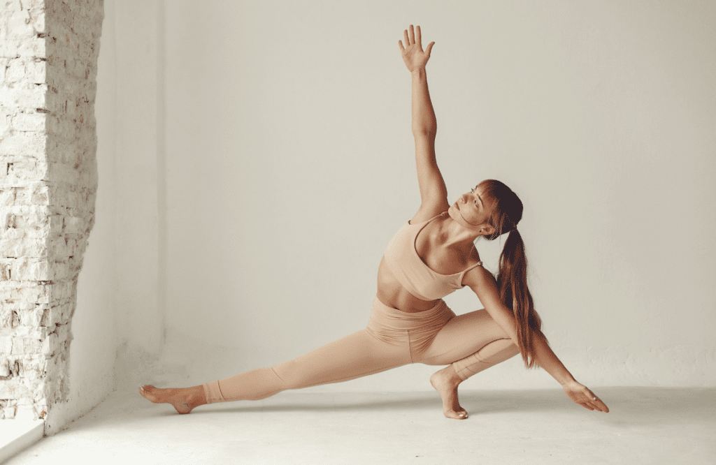 A woman does yoga stretches
